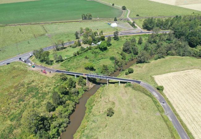 Newly profiled asphalt road by Nexpave, connecting to the recently completed Cedar Point Bridge in Kyogle.